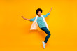 © deagreez - Full body photo of cheerful funny crazy afro american girl enjoy dance autumn holiday emotions raise hands wear white blue fluffy waistcoat pants shine isolated bright color background