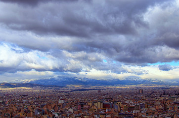 Stormy sky and gloomy clouds. Aerial view over the city of Athens. Famous touristic place and romantic travel destination. Athens, Greece