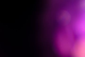 Poster - purple flare on a black background. light for design