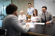 © NDABCREATIVITY - Successful group of business people at work in office