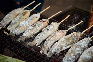 Canvas Print - Salted fish skewer on grill 