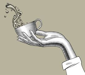 Wall Mural - Hand holding a Coffee cup with a splashed water