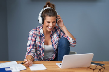 Female student learning at home