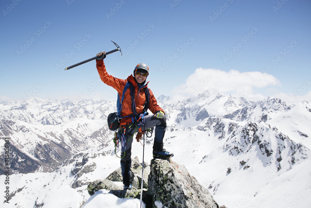 alpinism in the snowy mountains - obrazy, fototapety, plakaty 