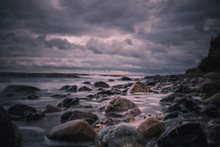 Large Rocks On Stormy, Overcast Nighttime Beach, Bisserup, Denmark
