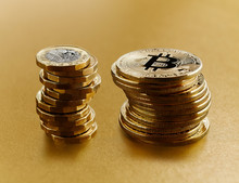 Golden Bitcoins Stacked Next To British Pound Coins