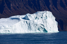 Large Iceberg On Sunny Blue Atlantic Ocean Greenland