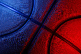 Closeup detail of basketball ball texture background. Blue neon Banner Art concept