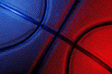 Wall Mural - Closeup detail of basketball ball texture background. Blue neon Banner Art concept