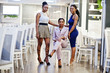 © AS Photo Family - Three african woman in dress posing at restaurant.