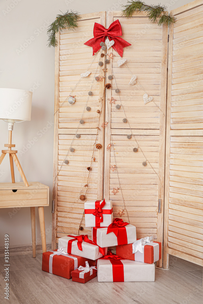 Interior of room with creative Christmas tree