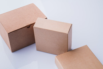 Wall Mural - Three unpacked cardboard boxes. Isolated on white.