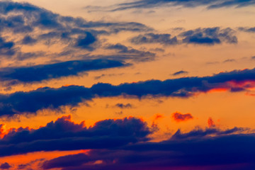 Wall Mural - orange sunset sky with clouds. beautiful nature background
