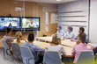 © Rafal Rodzoch/Caia Image - Business people in video conference meeting