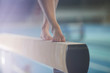 © Chris Ryan/Caia Image - Bare feet of female gymnast performing on balance beam