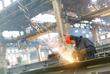 Welder Using Welding Torch In Steel Factory