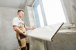 © Kadmy - vinyl windowsill installation at apartment during renovation