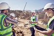 © Trevor Adeline/Caia Image - Construction workers and engineers meeting at sunny construction site