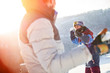 © Agnieszka Olek/Caia Image - Friends enjoying snowball fight in sunny, snowy field