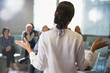 © Sam Edwards/Caia Image - Businesswoman gesturing, leading conference room meeting