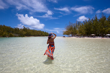 Girl in the white beaches in Ile aux Cerfs, Mauritius