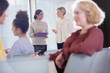 © Sam Edwards/Caia Image - Businesswomen talking in conference audience