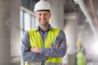 © Rafal Rodzoch/Caia Image - Portrait smiling engineer at construction site