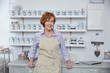 © Agnieszka Olek/Caia Image - Portrait smiling, confident female business owner in art paint shop