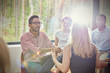 © Caiaimage/Agnieszka Olek/Caia Image - Attentive man listening to woman in group therapy session