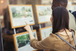 © Caiaimage/Paul Bradbury/Caia Image - Young couple browsing real estate listings at storefront