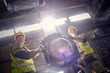 © Caiaimage/Agnieszka Olek/Caia Image - Steelworkers moving steel part in steel mill