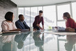 © Caiaimage/Martin Barraud/Caia Image - Businessman leading conference room meeting