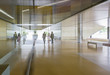 © Caiaimage/Martin Barraud/Caia Image - Business people walking in modern office lobby corridor