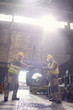 © Caiaimage/Agnieszka Olek/Caia Image - Steelworkers moving steel part in steel mill