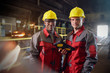 © Caiaimage/Agnieszka Olek/Caia Image - Portrait confident steelworkers with digital tablet in steel mill