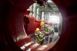 © Caiaimage/Agnieszka Olek/Caia Image - Steelworkers examining steel equipment in steel mill