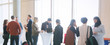 © TomMerton/Caia Image - Business people networking, talking at conference