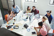 © Robert Daly/Caia Image - Computer programmers working in open plan office