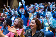© Sam Edwards/Caia Image - Smiling, happy audience clapping