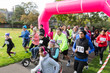 © Sam Edwards/Caia Image - Runners running at charity run in park