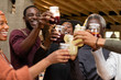 © Sam Edwards/Caia Image - Multi-generation family toasting lemonade and sangria