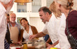 © Trevor Adeline/Caia Image - Chef explaining to active senior friends in cooking class