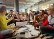 © Robert Daly/Caia Image - Creative business team meeting, brainstorming in circle on floor