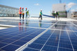 © Trevor Adeline/Caia Image - Solar panels at sunny power plant