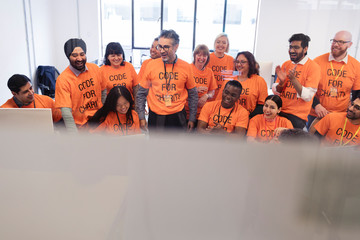 Hackers coding for charity at hackathon