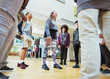 © Robert Daly/Caia Image - Teenagers talking in dance class studio