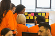 © Martin Barraud/Caia Image - Hackers coding for charity at hackathon