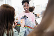 © Sam Edwards/Caia Image - Teenage girls designing denim jacket in fashion design class