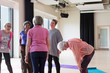 © Martin Barraud/Caia Image - Active seniors talking after exercise class