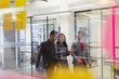© Sam Edwards/Caia Image - Business people walking in office
